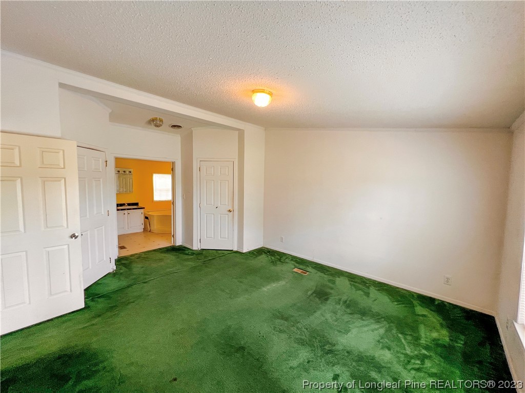 74 Decker Road St. Pauls, NC 28384 - Photo 35 of 46 a view of an empty room and yard