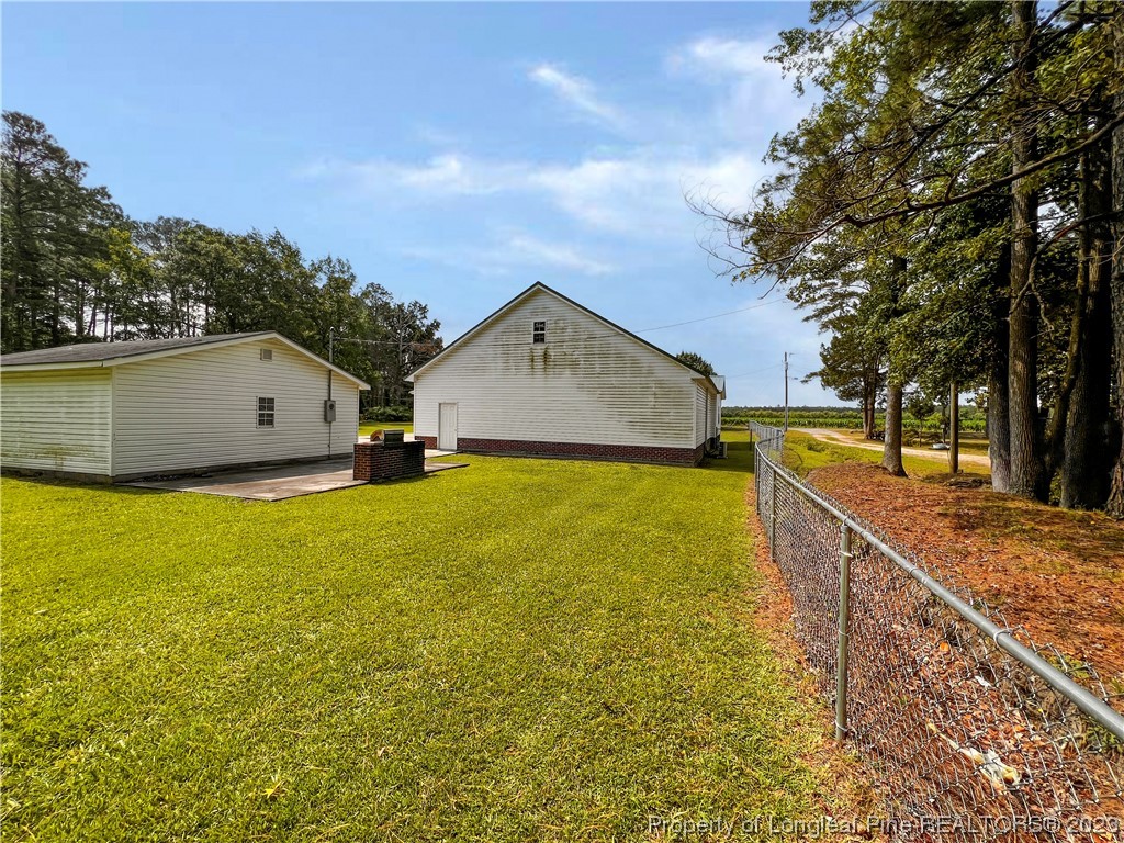 74 Decker Road St. Pauls, NC 28384 - Photo 9 of 46 a house view with a outdoor space