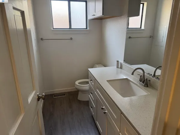 a bathroom with a sink and toilet