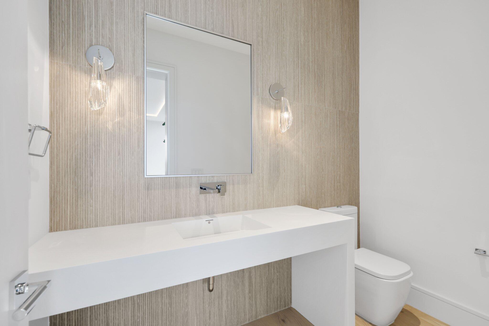 310 Grove Place Delray Beach, FL 33444 - Photo 41 of 92 a bathroom with a sink a toilet and shower