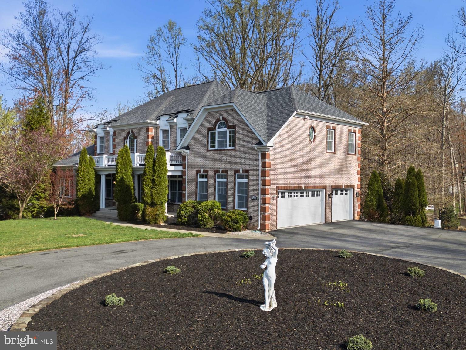 7501 Clifton Road Clifton, VA 20124 - Photo 10 of 93 a front view of a house with a yard