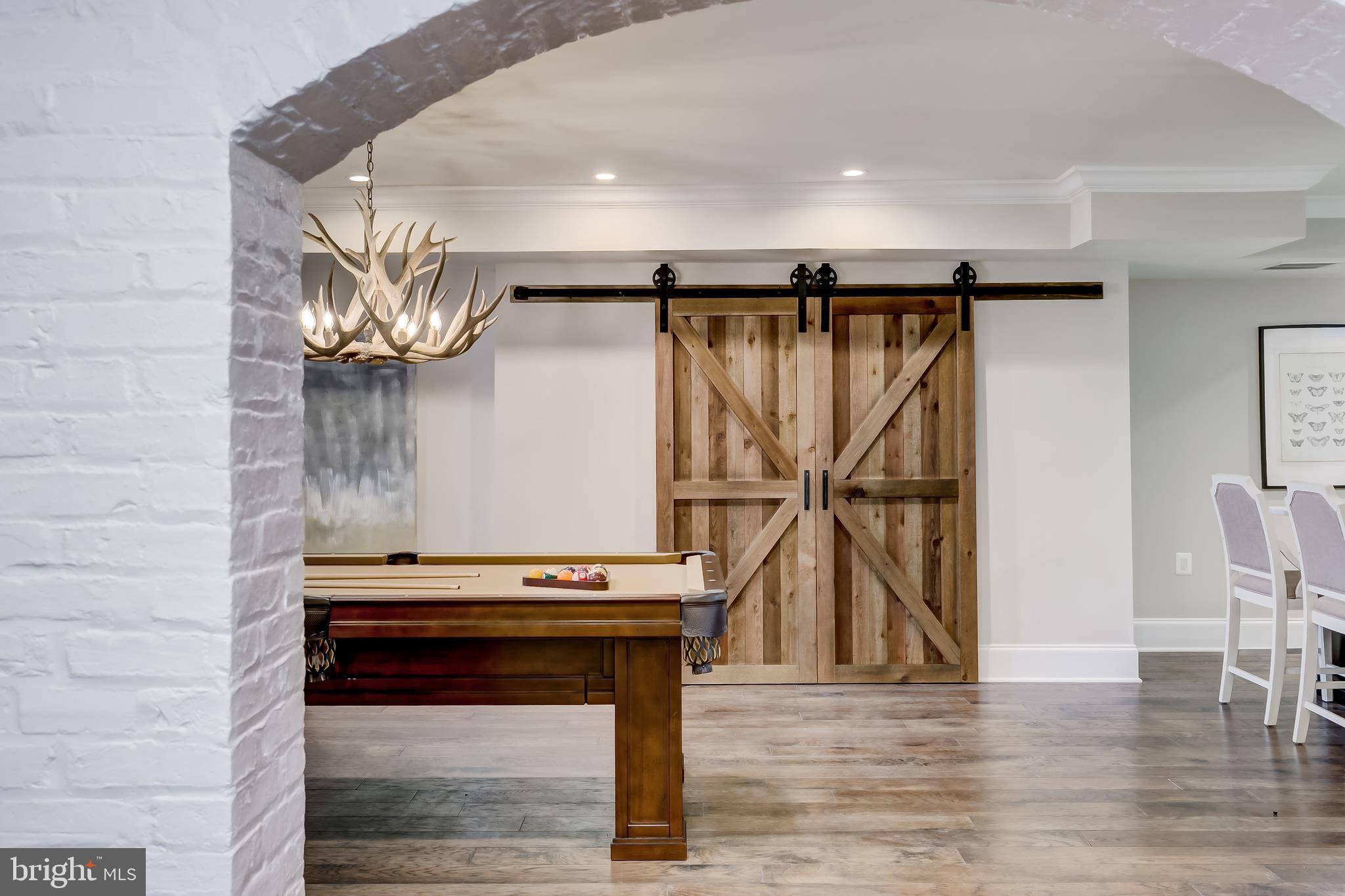 416 Garrison Forest Road Owings Mills, MD 21117 - Photo 65 of 95 Vintage Stag Chandelier & Rustic Barn Door