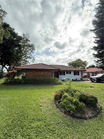 a view of a house with garden
