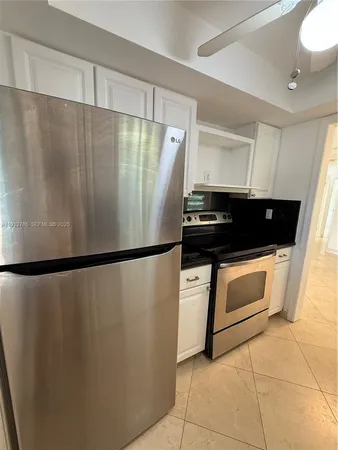 a view of a refrigerator and window
