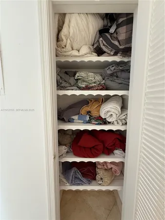 a room with a book shelf