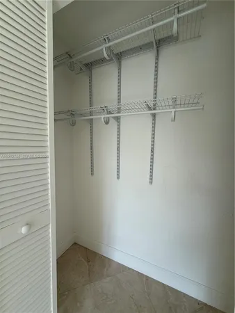 a view of a room with racks on the wall