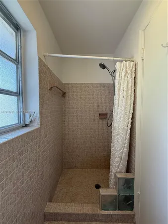 a bathroom with a sink a vanity and a mirror