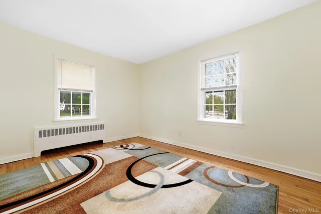 a room with furniture and a window