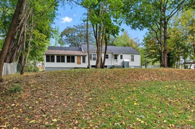 a house with trees in front of it