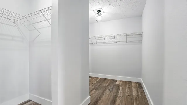 a view of a room with racks on the wall