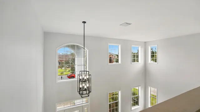 a view of a livingroom with wooden floor