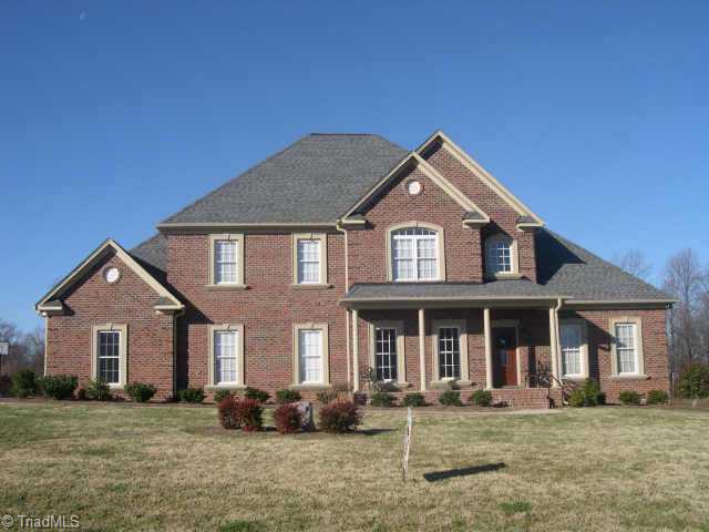 5807 Elkton Drive Oak Ridge, NC 27310 - Photo 1 of 9 Exterior Front.