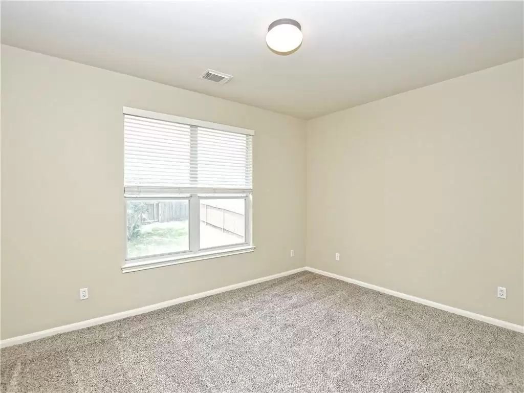 7005 Via Correto Drive Austin, TX 78749 - Photo 17 of 27 an empty room with a window