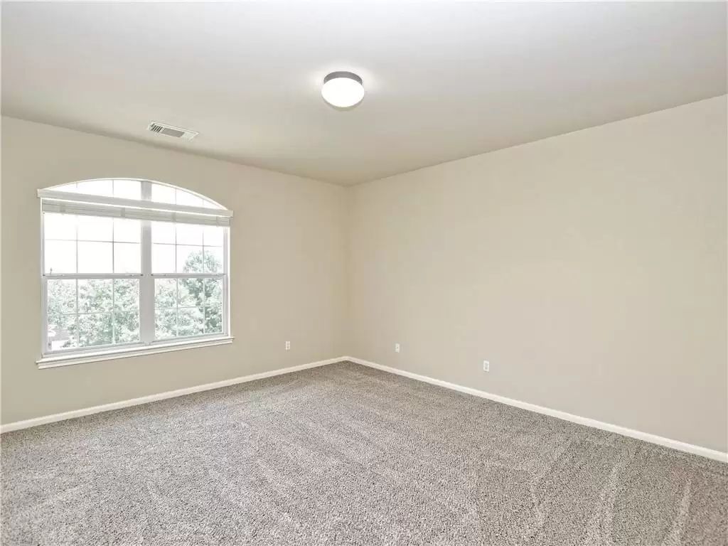 7005 Via Correto Drive Austin, TX 78749 - Photo 20 of 27 an empty room with a window