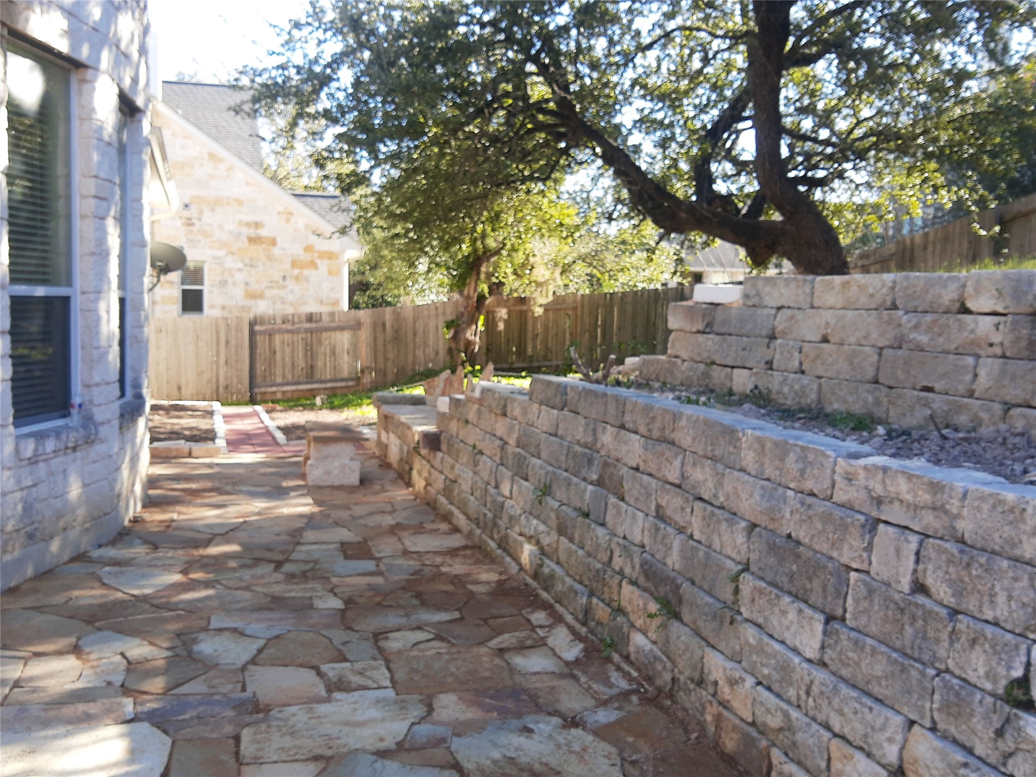 7005 Via Correto Drive Austin, TX 78749 - Photo 24 of 27 a backyard of a house with lots of green space