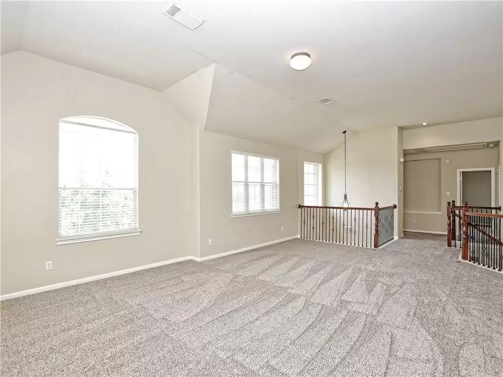 7005 Via Correto Drive Austin, TX 78749 - Photo 6 of 27 a view of an empty room with a window