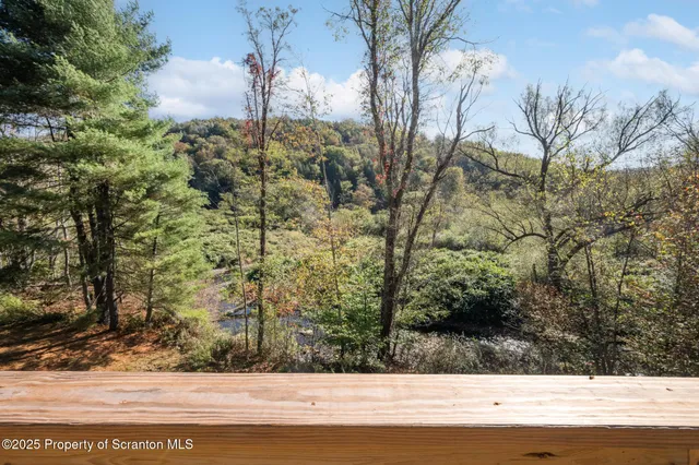 a bed room with a bed and a window