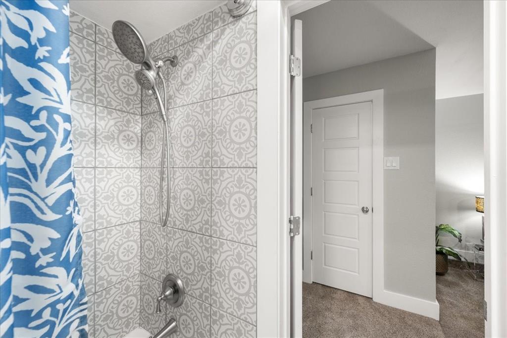 1405 Timberline Drive Benbrook, TX 76126 - Photo 19 of 26 a bathroom with a shower