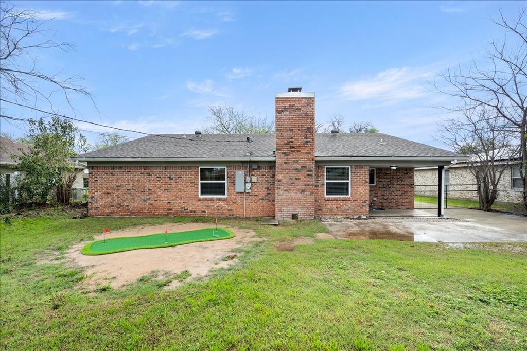 1405 Timberline Drive Benbrook, TX 76126 - Photo 26 of 26 a front view of house with yard and green space