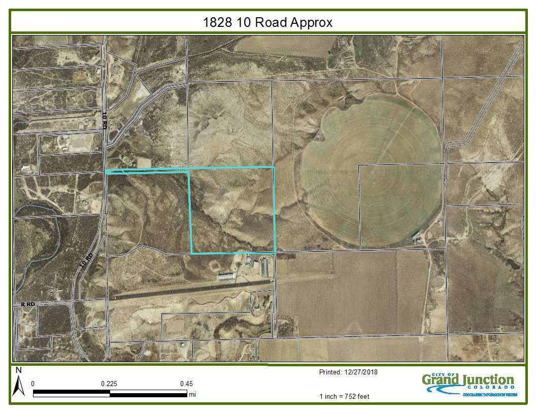 1828 10 Road Mack, CO 81525 - Photo 1 of 1 a black and white photo of a field