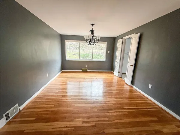 a view of an empty room with window