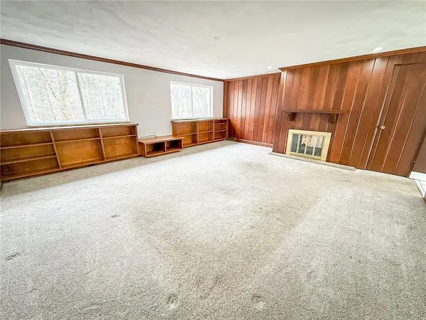 an empty room with windows