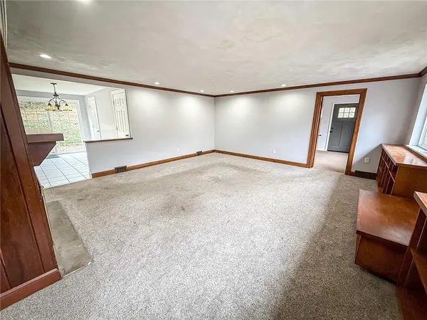 a big room with windows and closet