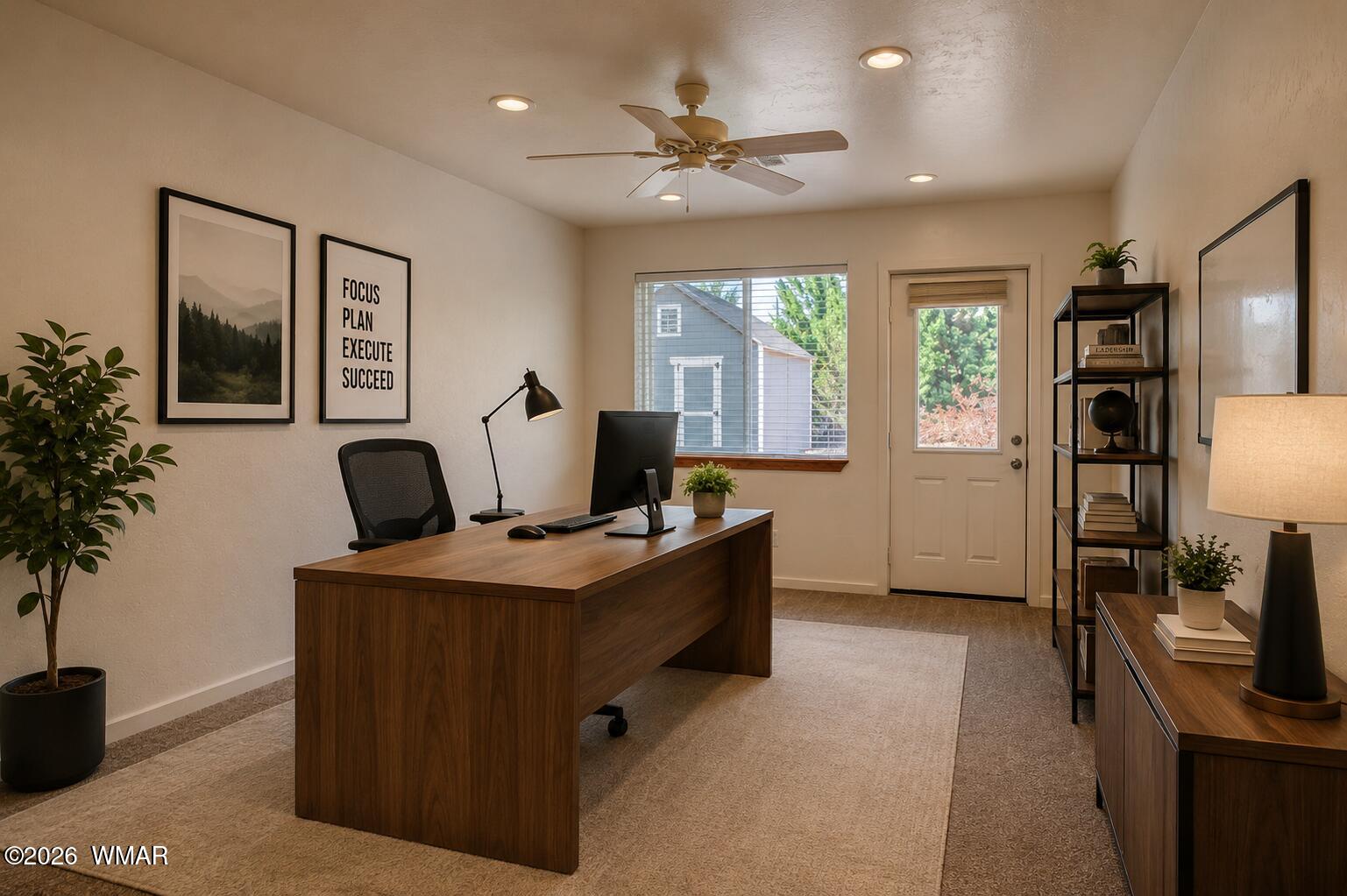 411 West Stratton Show Low, AZ 85901 - Photo 19 of 47 a view of a workspace with furniture and a potted plant