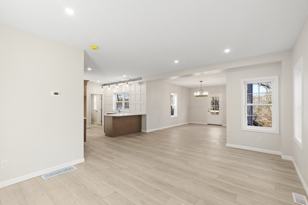 1234 State Road, Unit 1 Plymouth, MA 02360 - Photo 13 of 32 a view of a kitchen with a sink and a window