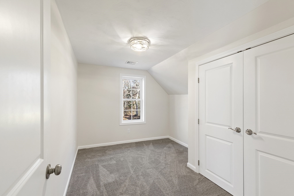 1234 State Road, Unit 1 Plymouth, MA 02360 - Photo 22 of 32 a view of an empty room and a window