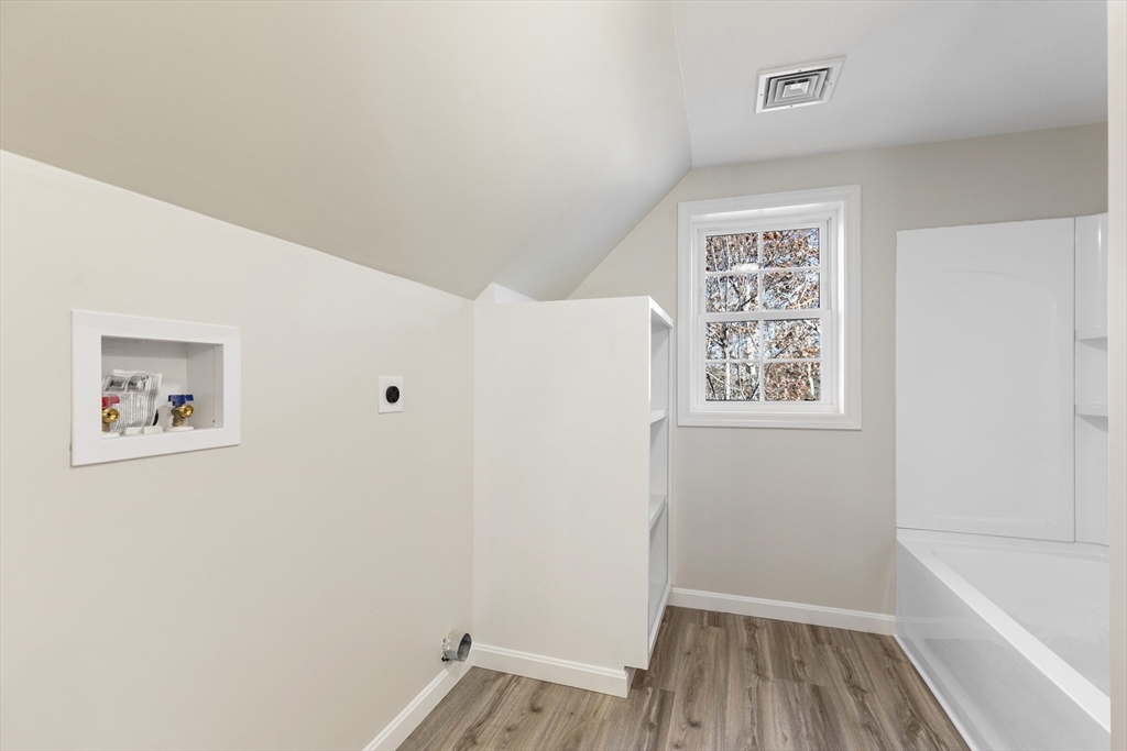 1234 State Road, Unit 1 Plymouth, MA 02360 - Photo 25 of 32 a view of room with window and hardwood floor