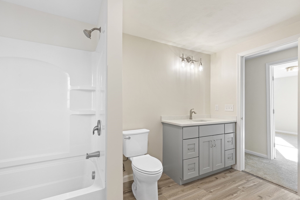 1234 State Road, Unit 1 Plymouth, MA 02360 - Photo 26 of 32 a bathroom with a sink a toilet and shower