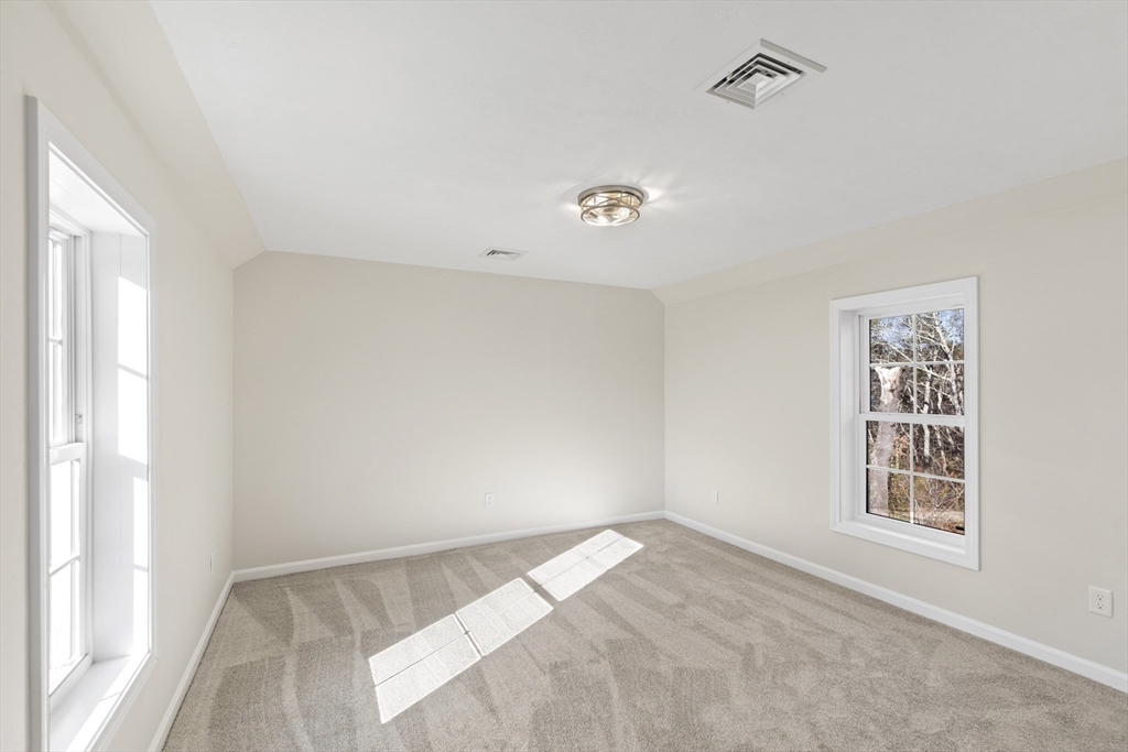 1234 State Road, Unit 1 Plymouth, MA 02360 - Photo 29 of 32 a view of an empty room and a window