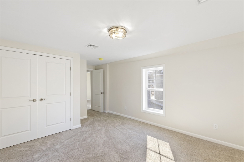 1234 State Road, Unit 1 Plymouth, MA 02360 - Photo 30 of 32 a view of an empty room with a window