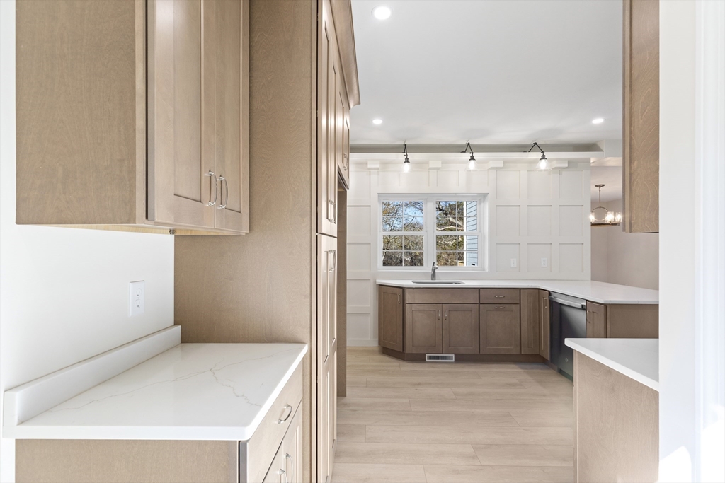 1234 State Road, Unit 1 Plymouth, MA 02360 - Photo 4 of 32 a bathroom with a tub sink and mirror