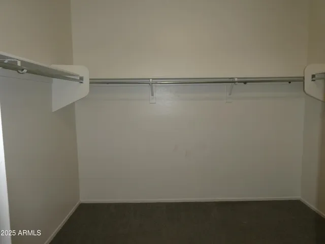 a view of small space with racks on the wall