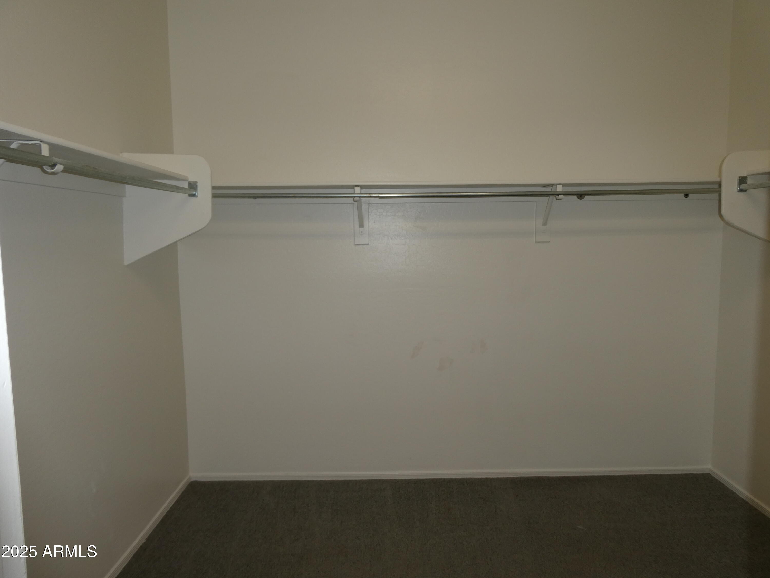 5027 Gallop Way Scottsdale, AZ 85254 - Photo 12 of 25 a view of small space with racks on the wall