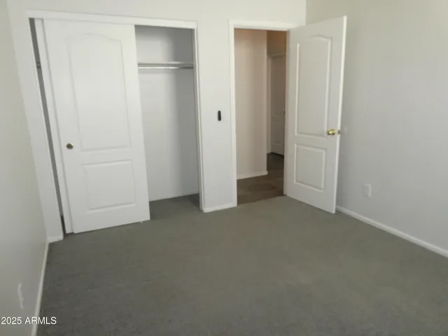 an empty room with closet