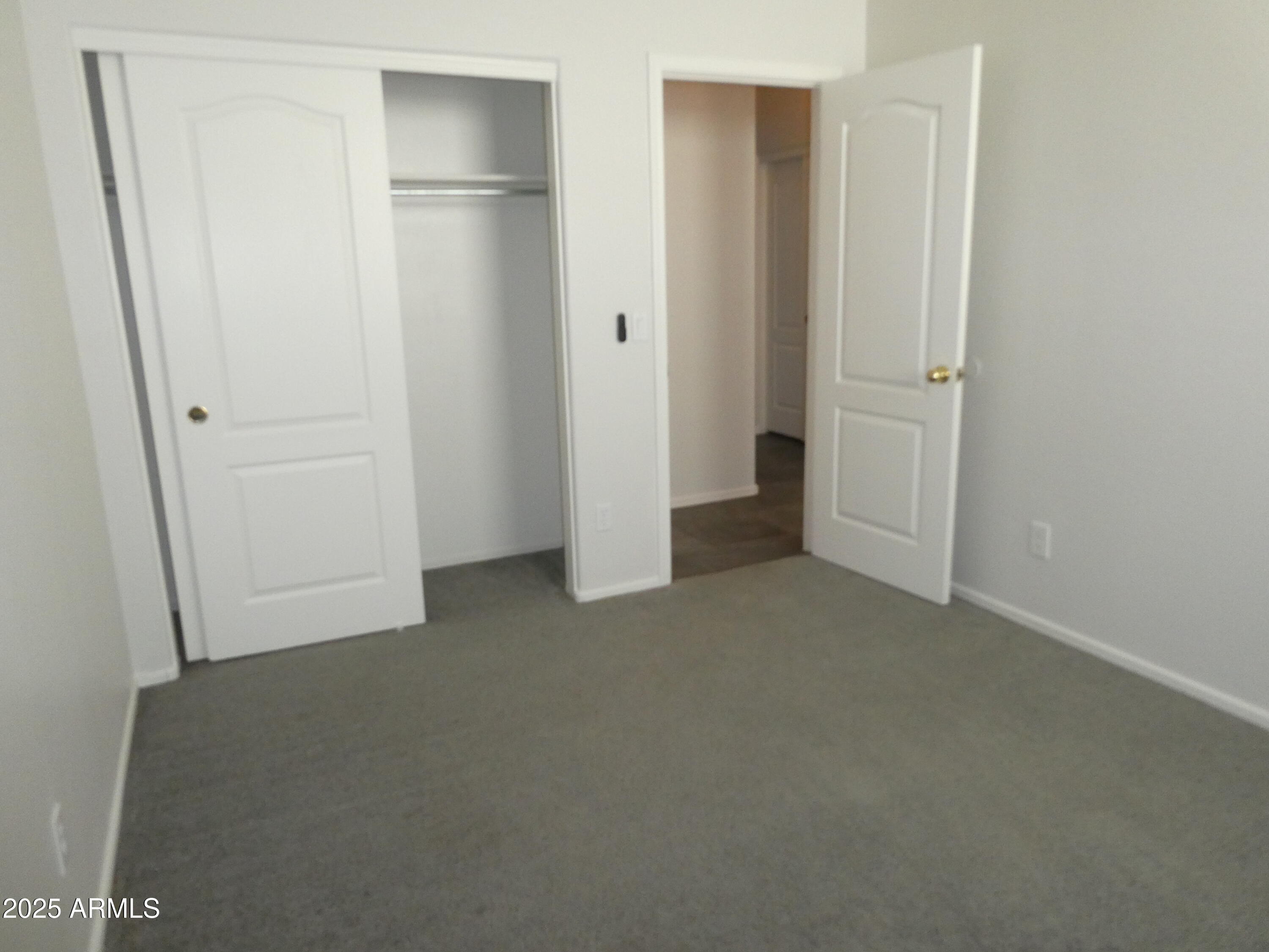 5027 Gallop Way Scottsdale, AZ 85254 - Photo 13 of 25 an empty room with closet