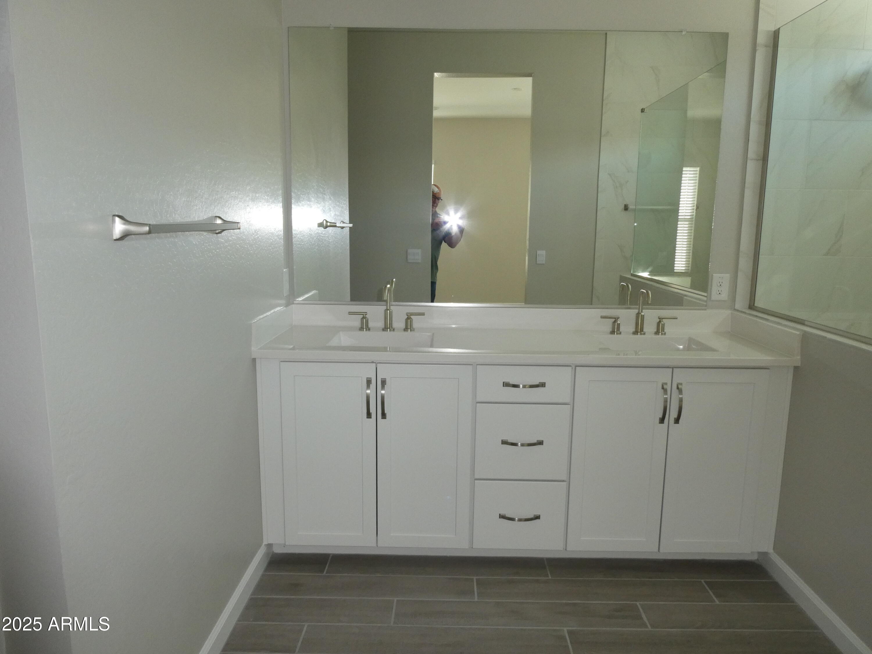 5027 Gallop Way Scottsdale, AZ 85254 - Photo 21 of 25 a bathroom with a sink and a mirror