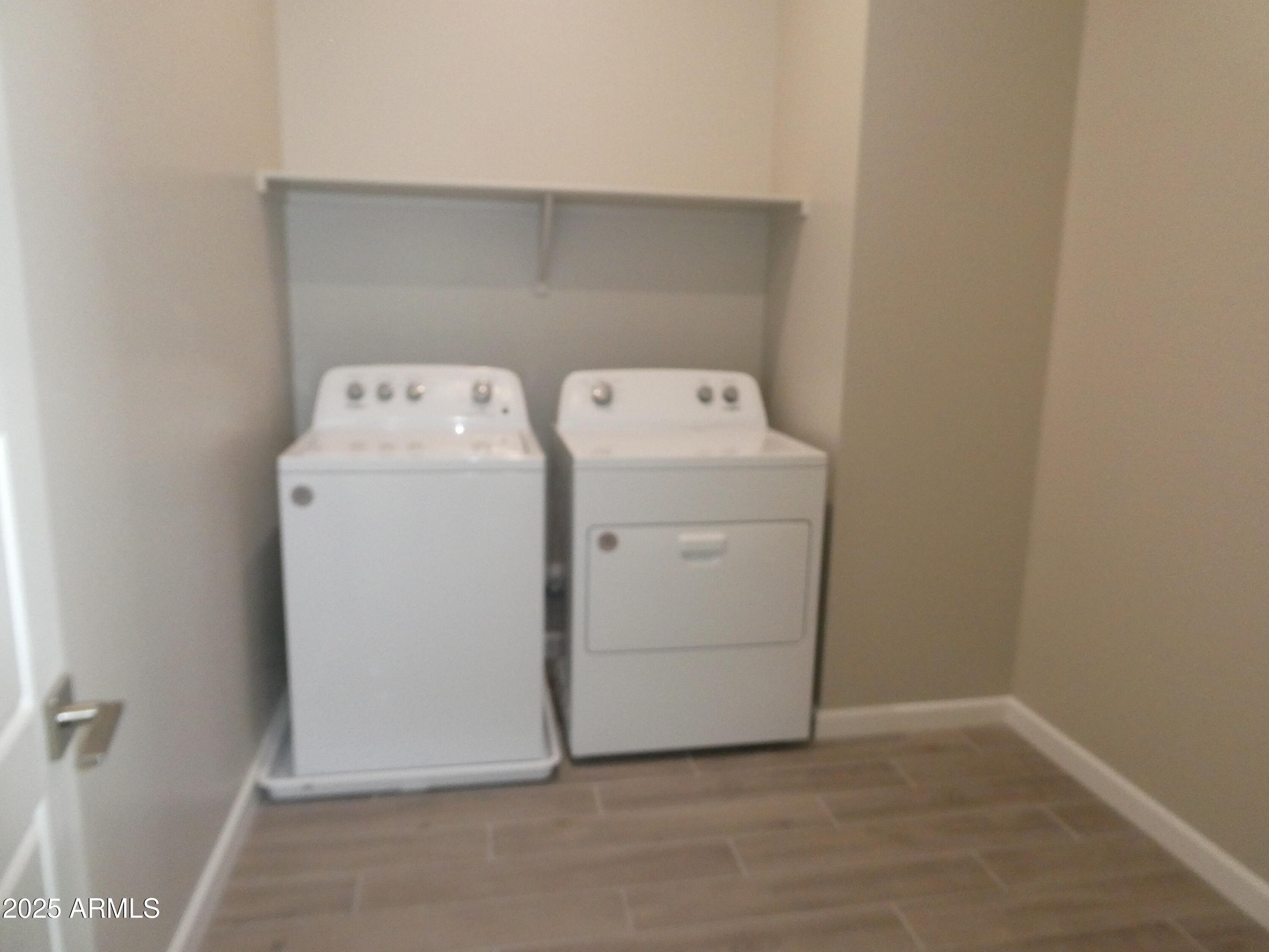 5027 Gallop Way Scottsdale, AZ 85254 - Photo 23 of 25 a utility room with dryer and washer