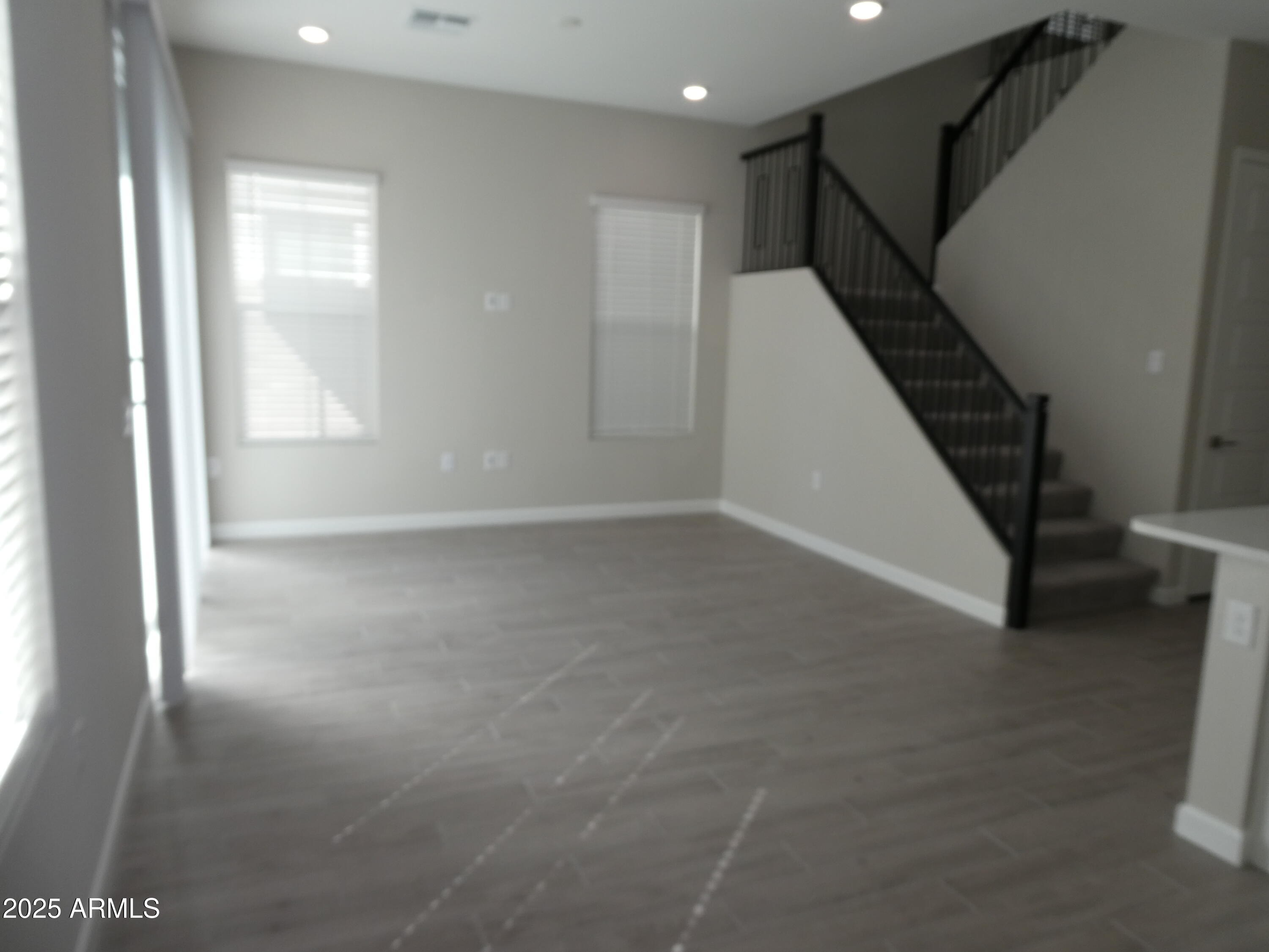 5027 Gallop Way Scottsdale, AZ 85254 - Photo 3 of 25 a view of an empty room with stairs
