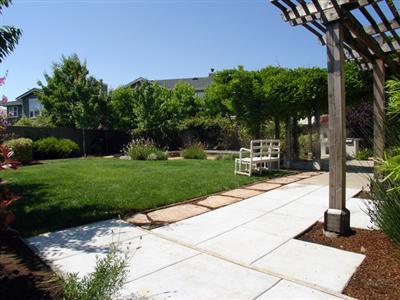 43 Moore Road Novato, CA 94949 - Photo 1 of 9 Wisteria-Draped arbor frames this large and lovely rear yard with built-in BBQ, wrap around patio for entertainment, raised planters, seasonal flowers with calming varieties such as mint and french lavender, beautifully romantic roses and honeysuckles, and exotic passion flowers all welcome you and your family home.