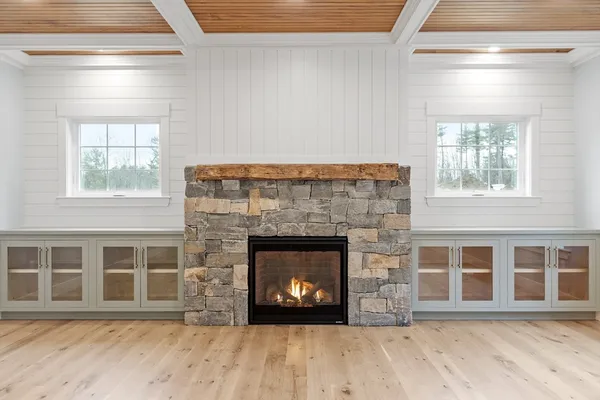 a living room with a fireplace in it