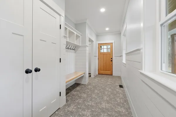 a view of a hallway with closet area