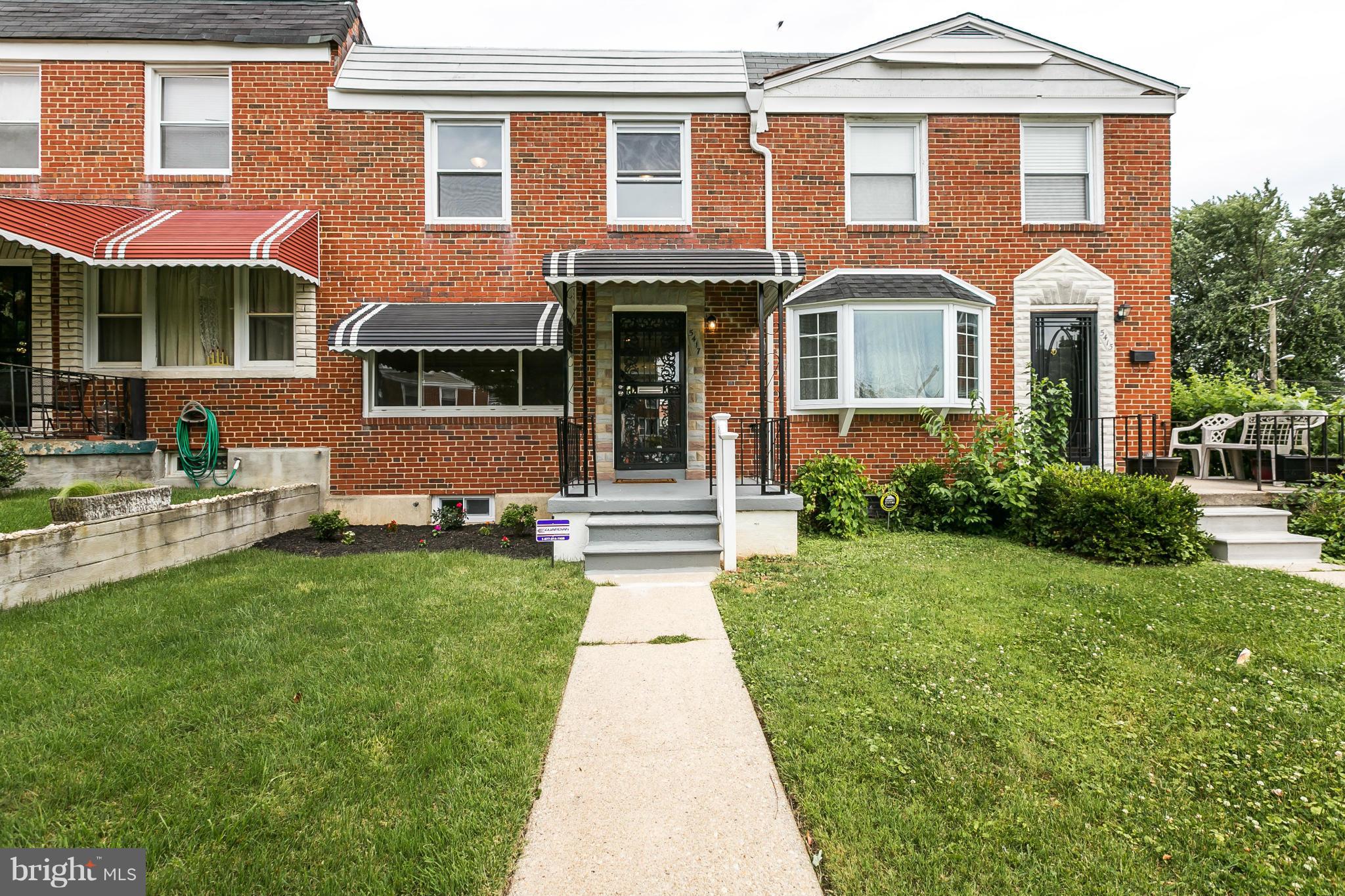 5417 Bucknell Road Baltimore, MD 21206 - Photo 1 of 30 a front view of a house with garden