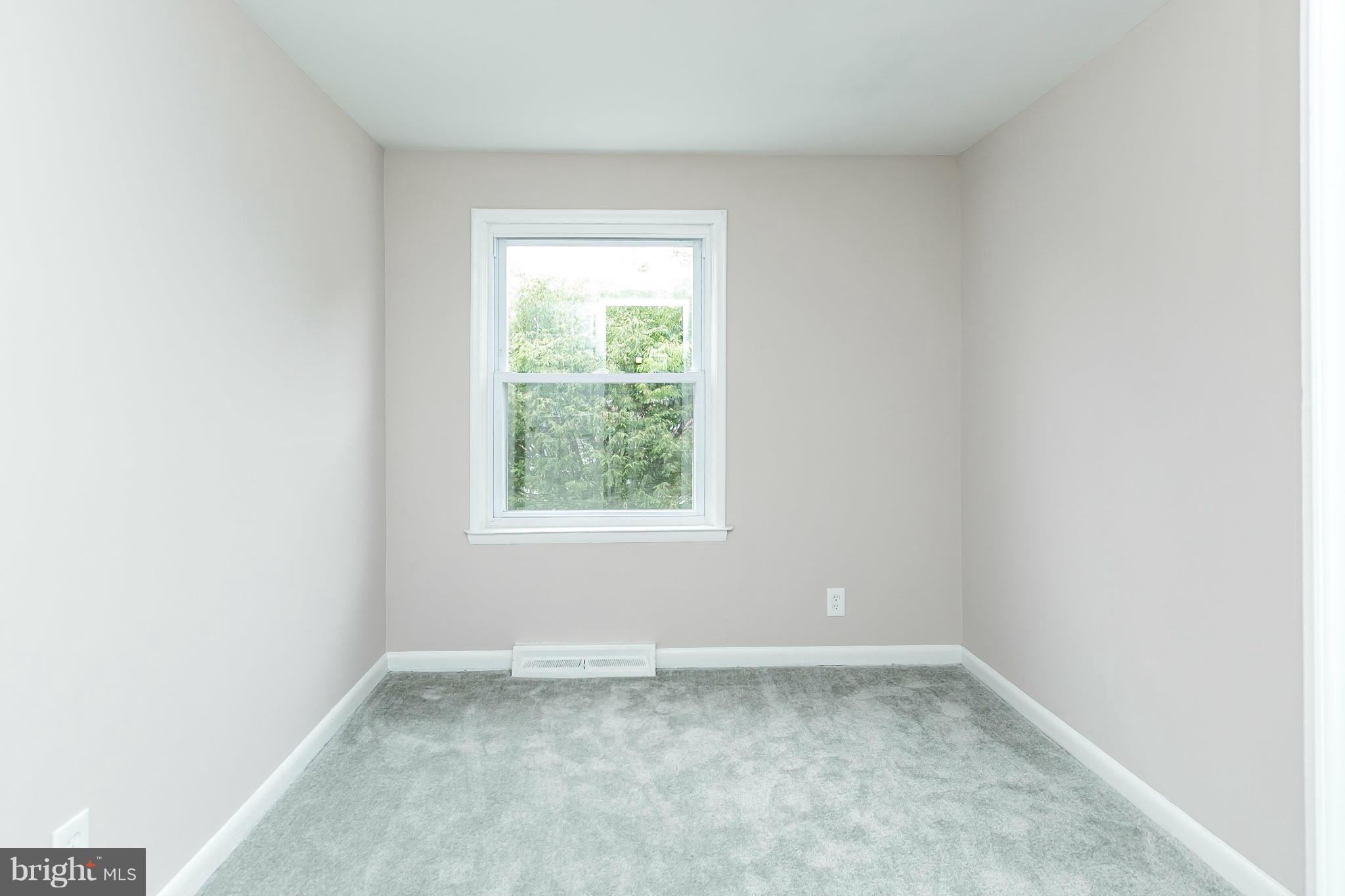 5417 Bucknell Road Baltimore, MD 21206 - Photo 19 of 30 an empty room with a window