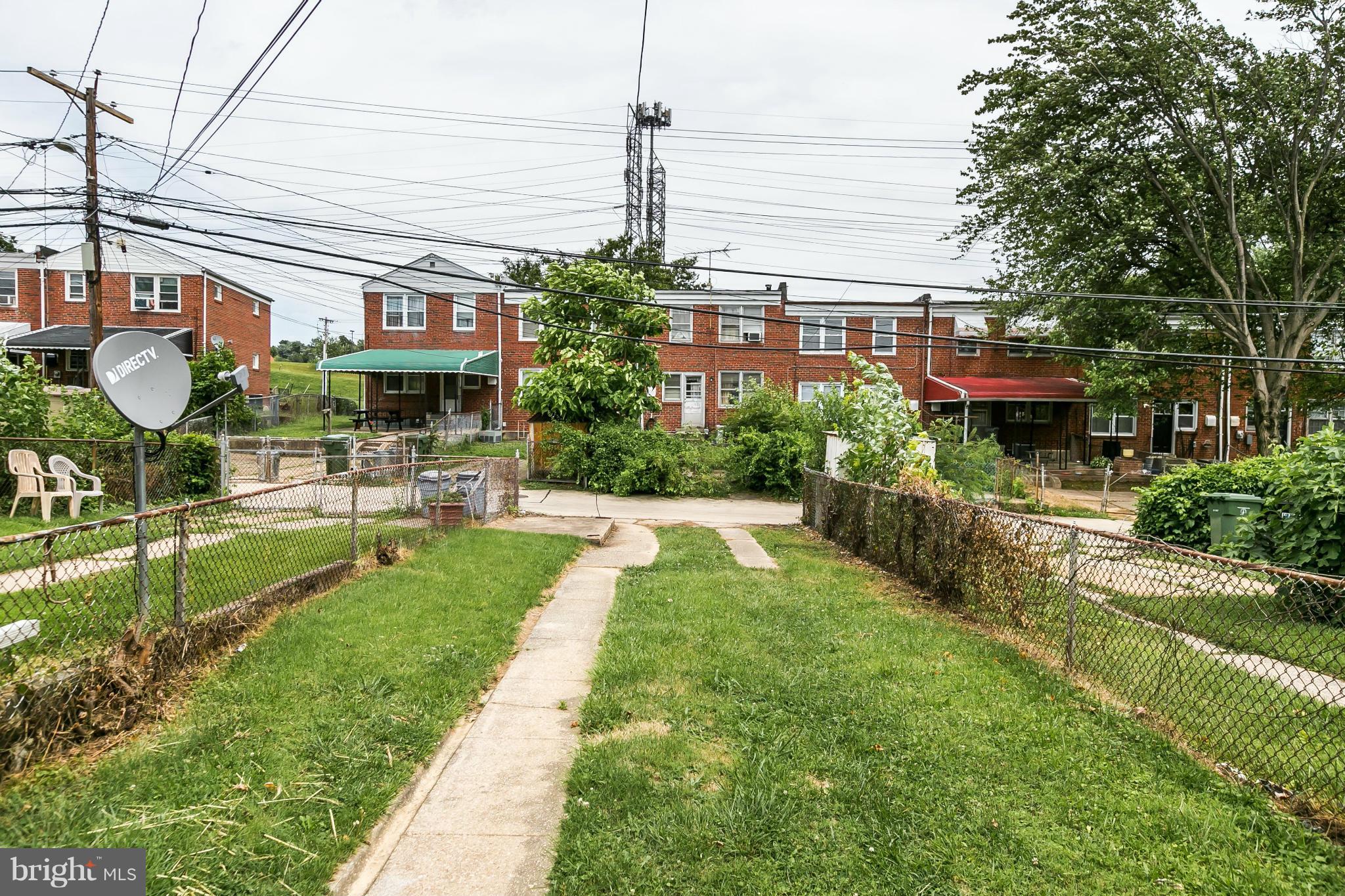 5417 Bucknell Road Baltimore, MD 21206 - Photo 29 of 30 a swimming pool with outdoor seating and yard