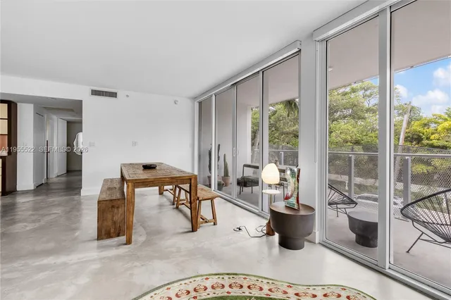 a kitchen with stainless steel appliances granite countertop a stove and a refrigerator