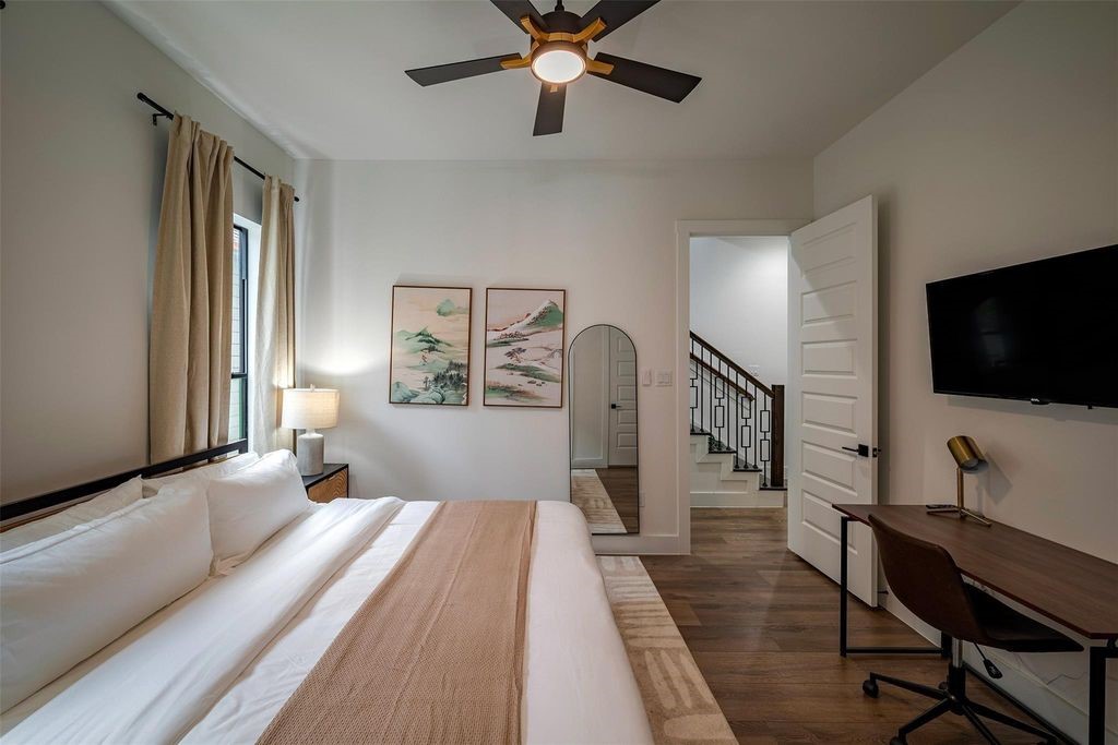 1305 East 27th Street, Unit B Houston, TX 77009 - Photo 19 of 27 a bedroom with furniture and a window